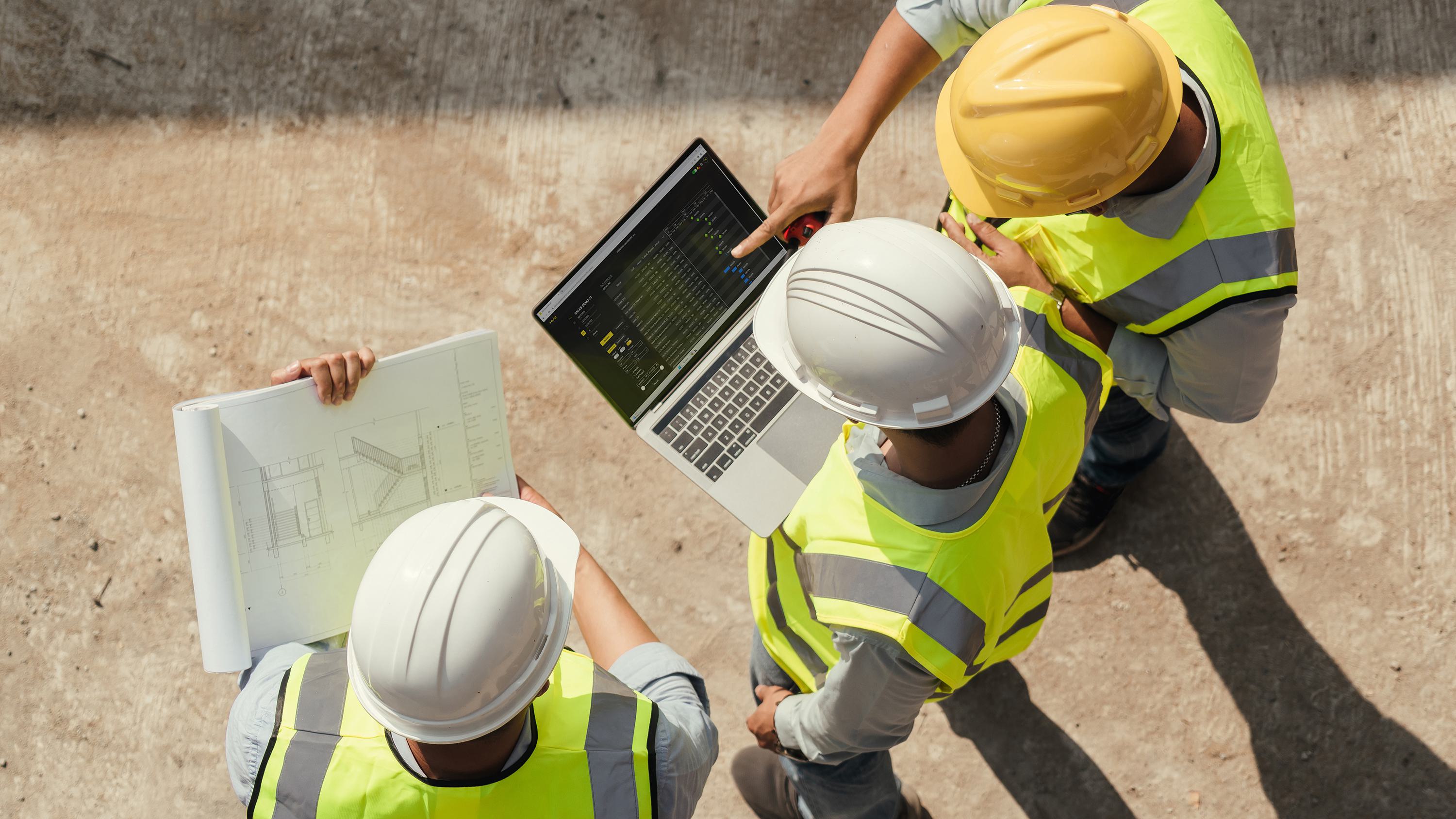 Stakeholders reviewing project controls dashboards